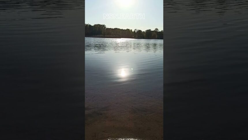 Dancing Sunbeams: A Mesmerizing Play of Light on the Lake